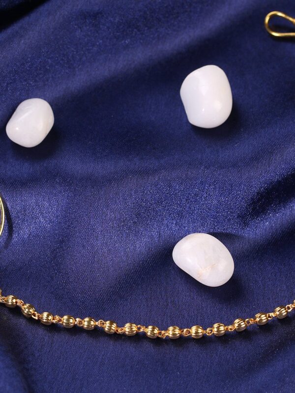 Gold finish with polki and stone detail nose ring