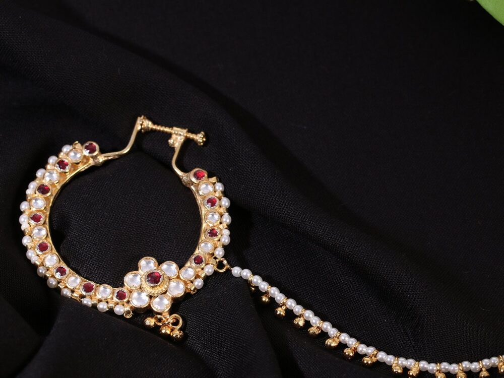 Gold finish with white and ruby kundan nose ring